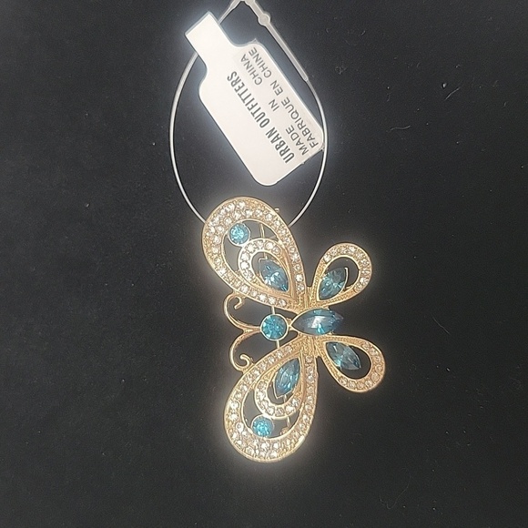 Urban Outfitters Gold Butterfly Pin with Teal and Clear Stones NWT - Picture 1 of 3